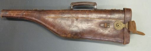 Brown leather leg of mutton gun case with brass lock, 79cm long.