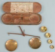 18thC / 19thC French travelling beam scale with cup and flat weights, the lid with table of coin