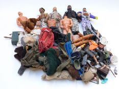 A collection of Action Man clothes and accessories together with various body parts and related