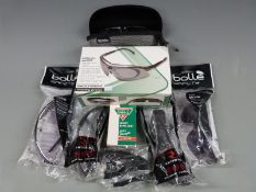 Six pairs of Bolle, Mirage and Konus shooting/ safety glasses, two with lanyards, all new in