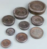 A run of A Kenrick & Son flat stacking weights from 4lb to 1/4lb, together with further similar