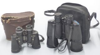 Cased Tasco 10x50 binoculars and a pair of Swift Apollo 8x30 binoculars