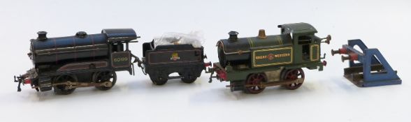 Two Hornby 0 gauge clockwork locomotives comprising GWR 0-4-0 tank loco and a BR 0-4-0 60199