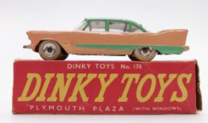 Dinky Toys diecast model Plymouth Plaza (with windows) with salmon and mint body, white tyres and