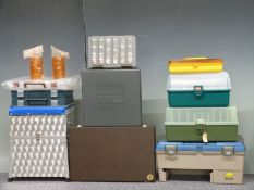 A three drawer seat box together with various tackle boxes