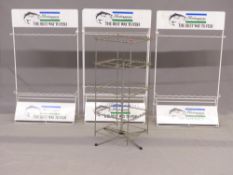 Three Shakespeare shop display stands and one rotating stand