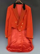 A hunting coat with tails, monogrammed CD buttons and green velvet collar, possibly for the Cotley