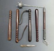 A replica mace together with four wooden police truncheons and a dagger