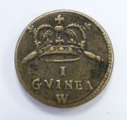 Queen Anne brass coin weight for one gold guinea, left facing bust obverse, crown and crossed