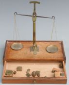 18thC/early 19thC probably French bullion scales, the drawer housing a run of cup weights and