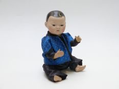 Armand Marseille bisque headed Japanese doll with closed mouth, fixed brown eyes, painted hair and
