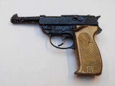 Lone Star James Bond 007 'Automatic' pistol cap gun with gold plastic grips.