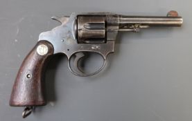 Deactivated Colt Police Positive .38 six shot double action revolver with chequered wooden grips,