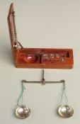 19th / early 20thC wooden cased diamond scales with carat weights. Length of box 16cm