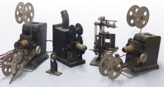 Four hand-cranked 35mm film projectors