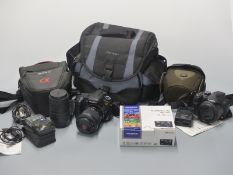 Quantity of cameras including Sony DSLR-A350 with 3.5-5.6 18-70mm lens and Sigma 100-300mm 1:4.5-6.7