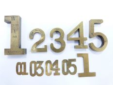 A run of ten Troy ounce number weights, some marked Rd 430343 from 1oz downwards