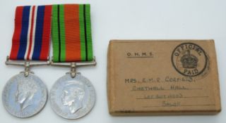 British Army WWII medals comprising War Medal and Defence Medal with box addressed to Mrs E.M.R.