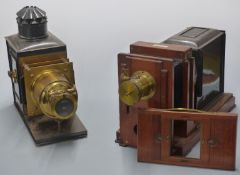 Two large late 19thC magic lanterns or enlargers, one with propeller trade mark, the other with