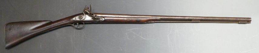 Daykin 18 bore flintlock hammer action sporting gun with named and engraved lock, iron butt plate,