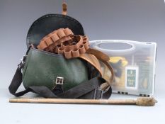 Bisley shotgun cleaning kit in original box together with three cartridge belts and a cartridge bag.