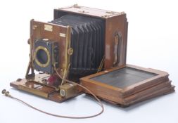 Sanderson plate camera in teak or similar case with Thornton Pickard shutter in canvas covered