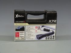 LED Lenser X7R professional rechargeable torch/ light, new in original hard carry case.