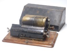 Brunsviga vintage mechanical calculator No 1450, with Odhner patents listed to end, in carry case