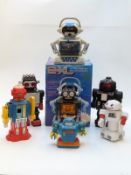 Seven various robots including Tiger Electronics 2-XL in original box