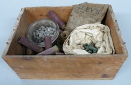 A collection of 44-40 brass cases and bullet heads, 10 bore shotgun cartridge cases, shot etc