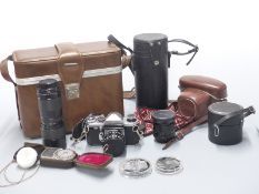 Edixa Prismat SLR camera, together with 2.8 50mm lens and Vivitar 28mm 1:2.5 and 85-205mm 1:3.8