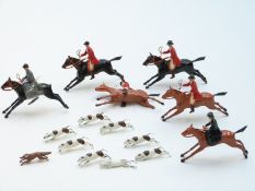 Britains lead model hunting set compromising six huntsmen and women and horses, eight hounds and a