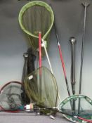 Seven various landing nets with handles including Sigma, Abu, extendable 3m examples etc