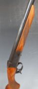 Baikal .12 bore single barrelled shotgun with engraved locks, semi-pistol grip and 28.5 inch