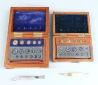 Two county standard cased set of weights, one County of Cambridge, 100gr to 0.1gr, the other City of