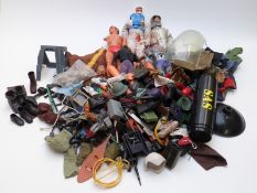 A collection of Action Man, The Six Million Dollar Man and similar figures, outfits and