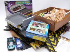 A collection of Scalextric cars, track and accessories including Digital Lap Counter C7039, Racing