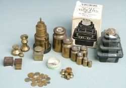 Quantity of various weights including a run of Avery cylindrical weights, apothecary weights,