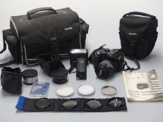 Fujifilm Finepix S9500 digital camera fitted with 28-300mm lens, two converters, one marked macro,