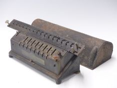 TIM mechanical calculator sold by Time-into Co Chicago with original metal cover