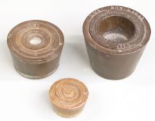 Three runs of nesting cup weights, largest from XVI ounces downwards, smallest from 2oz downwards