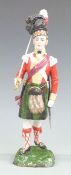Sitzendorf porcelain figure of a Seaforth Highlander 1815, 28cm tall