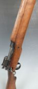 Lee Enfield bolt action .303 rifle converted to a .410 shotgun with pop-up ladder sights, sling