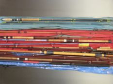 Five vintage fishing rods including Abu Atlantic Zoom