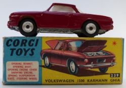 Corgi Toys dicast model Volkswagen 1500 Karmann Ghia with maroon body and yellow interior 239, in