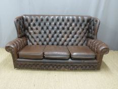 Brown leather Chesterfield sofa, length 184cm