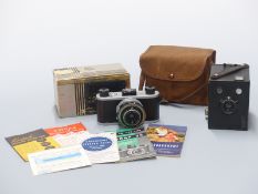 Kodak 35 camera in original box with instructions and a Box Brownie