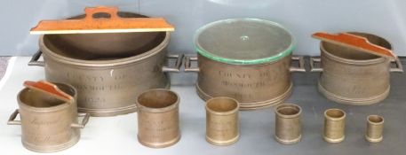 Georgian County of Monmouth standard bushel measure set, from one bushel to one gill, each marked