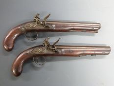 A pair of Lowther of London flintlock hammer action dueling or target pistols named locks, with