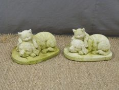 Pair of garden models of a dog and cat asleep, height 18cm
